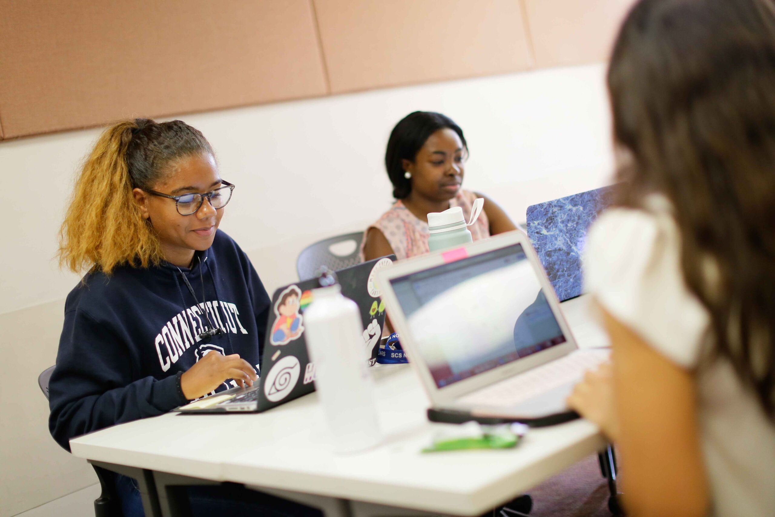 students studying on laptop