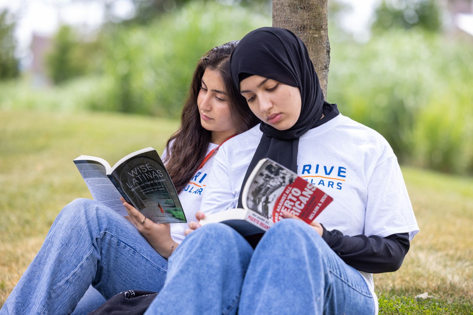 Thrive Scholars studying on a lawn